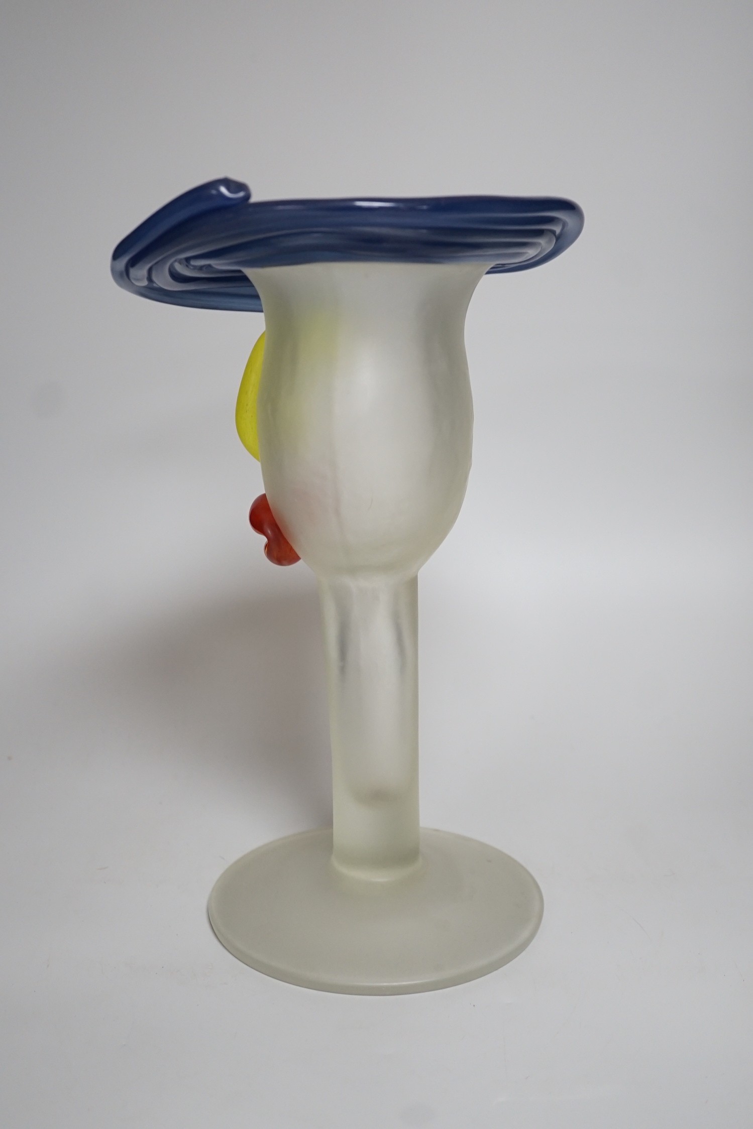 A novelty multi coloured head shaped studio glass vase, height 33cms